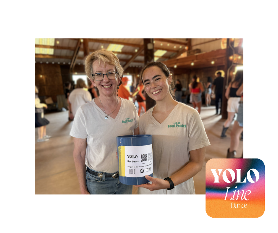 STEAC Food Pantry Manager and Food Program Coordinator holding a box of donations from YOLO Line Dance.